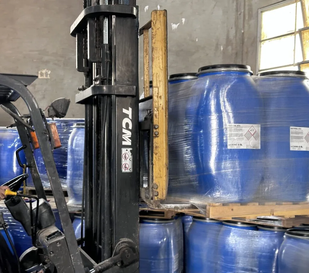 Raw material drums and handling equipment
